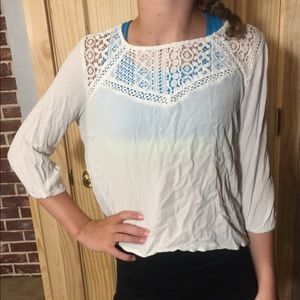 White blouse with crochet design